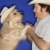 Dog and man in cowboy hats. stock photo © iofoto