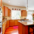 Wood luxury large kitchen with red and granite. stock photo © iriana88w