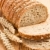 全粒粉パン · 台所用テーブル · パン · 小麦 · 穀物 · 食事 - ストックフォト © jirkaejc