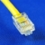 Close-up view of the yellow Ethernet (RJ45) cable isolated on blue stock photo © johnkwan
