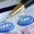Calculate the tax and the cost with a calculator stock photo © johnkwan