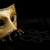 Golden mask and pearls on black stock photo © kalozzolak