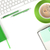 Green coffee cup and office supplies stock photo © karandaev