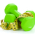 Two green dumbells and tape measure. Fitness and health stock photo © karandaev