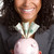 spaarvarken · vrouw · glimlachen · vrouw · geld · gezicht - stockfoto © keeweeboy