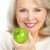 vrouw · volwassen · glimlachende · vrouw · groene · appel · voedsel - stockfoto © Kurhan
