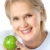 vrouw · appel · volwassen · glimlachende · vrouw · groene · voedsel - stockfoto © Kurhan