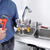 Klempner · Schraubenschlüssel · Hände · professionelle · Wasserhahn · Bau - stock foto © Kurhan