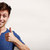 Happy young man with thumbs stock photo © Kurhan