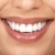 vrouw · tanden · mooie · vrouw · glimlach · geïsoleerd · witte - stockfoto © Kurhan