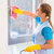 Cleaning lady with cloth at window stock photo © Kzenon