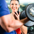 Personal Trainer in gym and dumbbell training stock photo © Kzenon