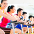 Asian people in spinning bike training at fitness gym stock photo © Kzenon