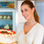 Female baker or pastry chef with torte stock photo © Kzenon