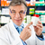 Pharmacist in pharmacy with medicament stock photo © Kzenon