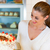 Female baker or pastry chef with torte stock photo © Kzenon