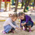 Happy little girls playing in a sendbox stock photo © Len44ik