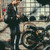 biker with motorcycle in workshop stock photo © LightFieldStudios