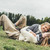 family lying on grass at countryside  stock photo © LightFieldStudios
