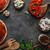 top view of various pizza ingredients on concrete table stock photo © LightFieldStudios