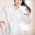 woman in bathrobe with cream on face stock photo © LightFieldStudios