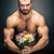 sportive man with bouquet of flowers stock photo © LightFieldStudios