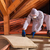 Man laying rockwool panels in the attic of a house stock photo © lightkeeper