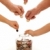 Hands of different generations saving coins stock photo © lightkeeper