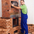 Worker building a masonry heater stock photo © lightkeeper