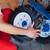 Man mounting tyre on a gasoline motor  tiller stock photo © lightkeeper