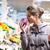 Pretty, young woman shopping for fruits and vegetables stock photo © lightpoet