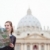 Pretty young female tourist studying a map at St. Peter's square stock photo © lightpoet