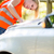Young female driver wearing a high visibility vest on the roadsi stock photo © lightpoet