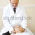 Chiropractor Adjusts Patient's Neck stock photo © lisafx