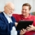 Teaching Dad to Use Tablet PC stock photo © lisafx