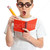 A comical boy student in geeky glasses writing in a book.   stock photo © lovleah