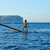 SUP Stand up Surf girl with paddle stock photo © lunamarina