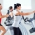 man and woman with elliptical cross trainer at gym stock photo © lunamarina