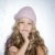Thinking gesture little girl winter pink cap portrait stock photo © lunamarina