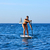 SUP Stand up Surf girl with paddle stock photo © lunamarina