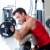 man with weight training equipment on sport gym stock photo © lunamarina