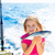 Blond kid girl fishing tuna little tunny happy with catch stock photo © lunamarina