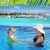 daughter and mother in swimming pool tropical stock photo © lunamarina