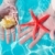 Hands starfish and seashell in tropical water stock photo © lunamarina