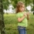 copil · fată · joc · parc · verde · frunze - imagine de stoc © lunamarina