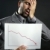Businessman with bad sales reports chart stock photo © lunamarina