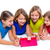 sisters kid girls with tech tablet pc playing happy stock photo © lunamarina