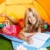 Children girl writing notebook in camping tent with flowers stock photo © lunamarina
