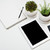 Tablet mock-up and office supplies on white tabletop background stock photo © manera