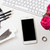 smartphone, computer keyboard and fesh pink flowers on white tab stock photo © manera